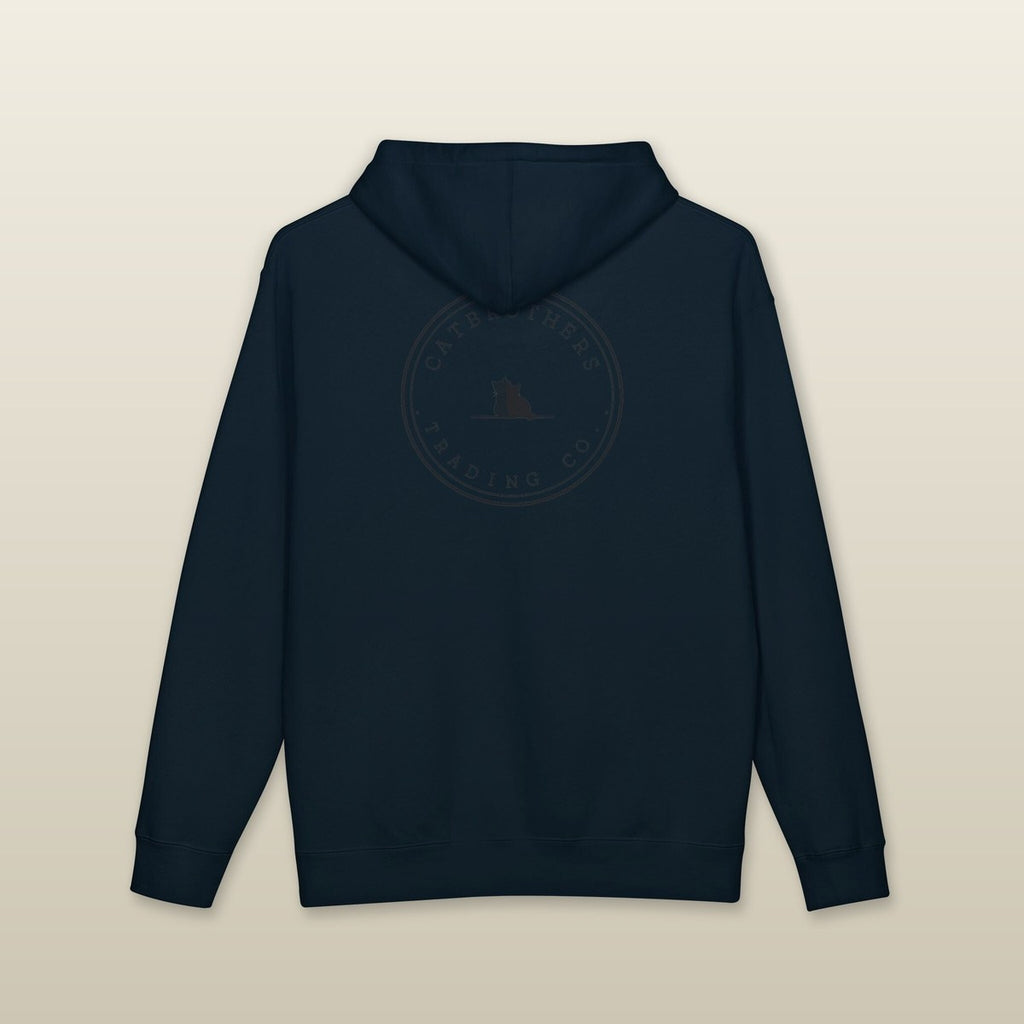 The Sunday in Navy, back — tonal Trading Co. badge