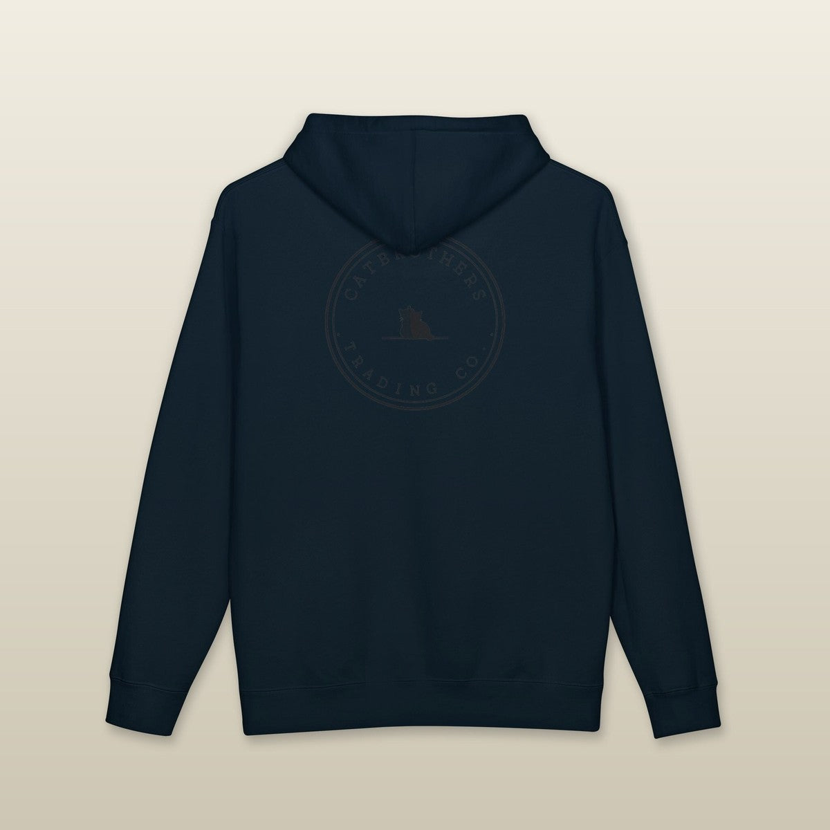 The Sunday in Navy, back — tonal Trading Co. badge