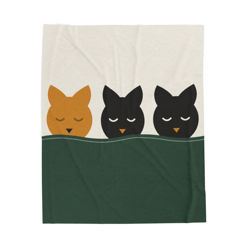 The Nap, flat — all three heads of the mark, edge to edge on velveteen plush