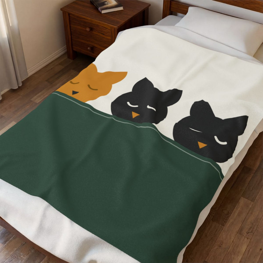 The Nap draped over a bed — velveteen plush throw in a bedroom